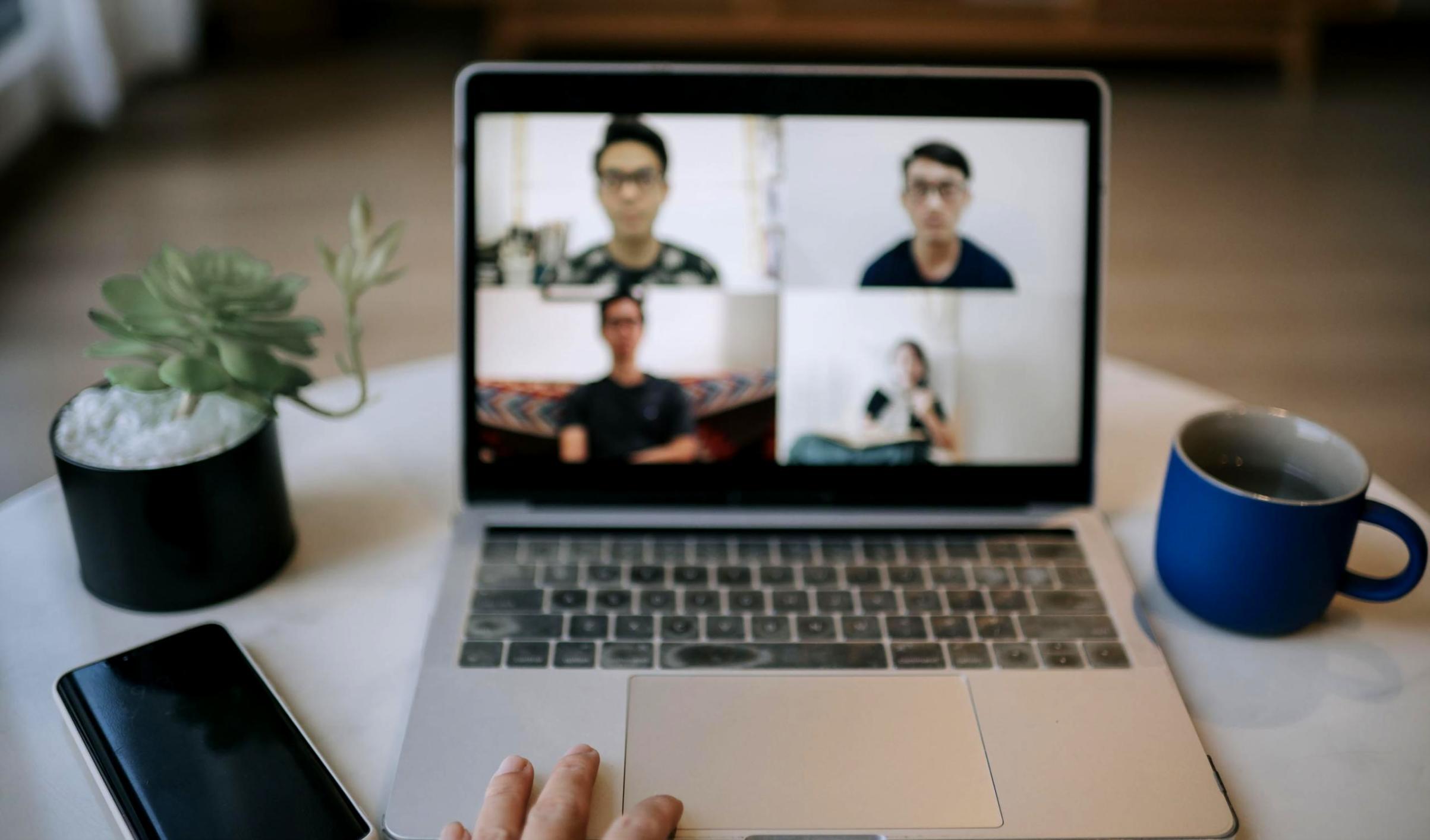 Instructor demonstrating quadrat sampling methodology in grassland ecosystem